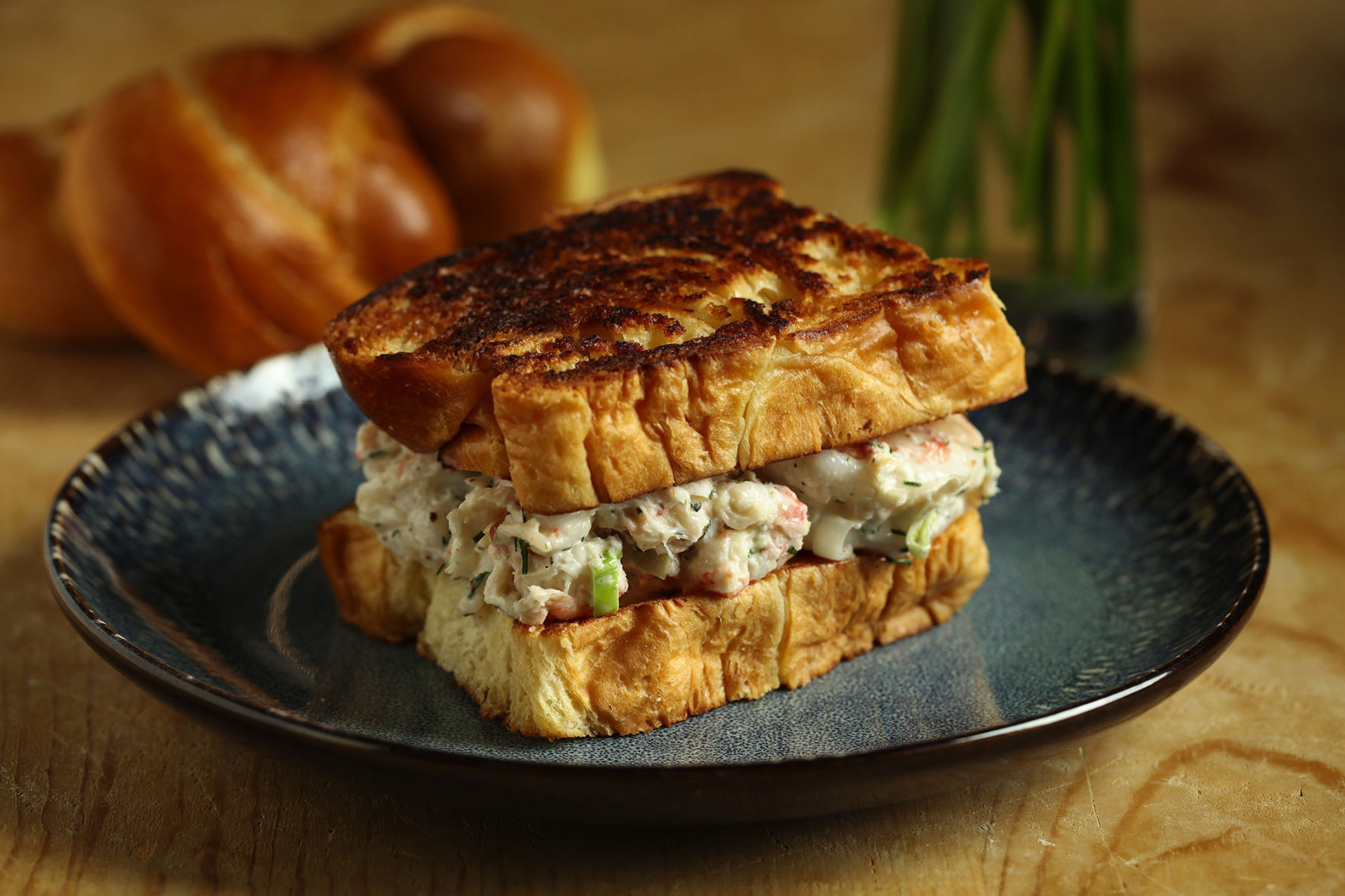 Creamy seafood rolls on brioche